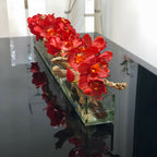 Moderner Glaspflanztopf „Modern Home“ 122 cm mit roten Cymbidien